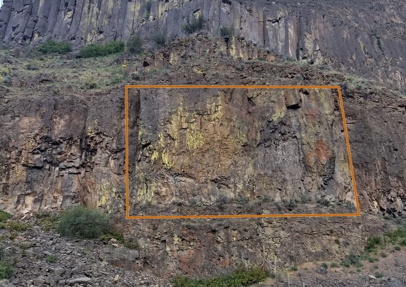 Econo Ledge is the orange, yellow and grey formation at the center of the photo.