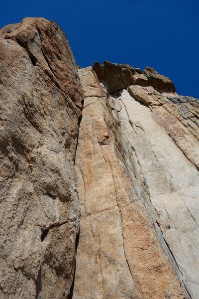 Coyote climbs the right side of the arete.