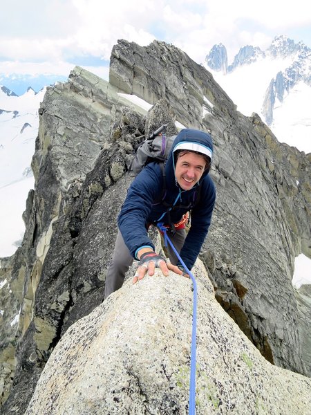 Topping out on north summit with south summit and Howsers in the background.