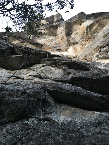 looking up from the belay "pedestal" at the base of proud snapper in yosemite