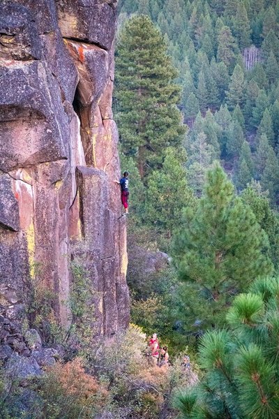 "Huggy Bears" Iron Man Variation as seen from the west of the crag.  Climber is standing on top of the second ledge.