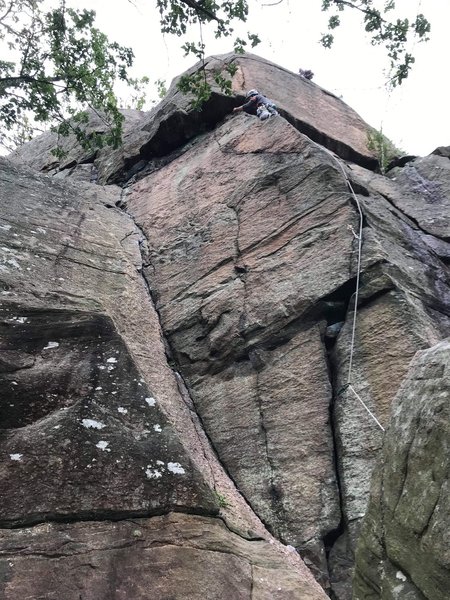 Climber entering the small roof section before the top-out