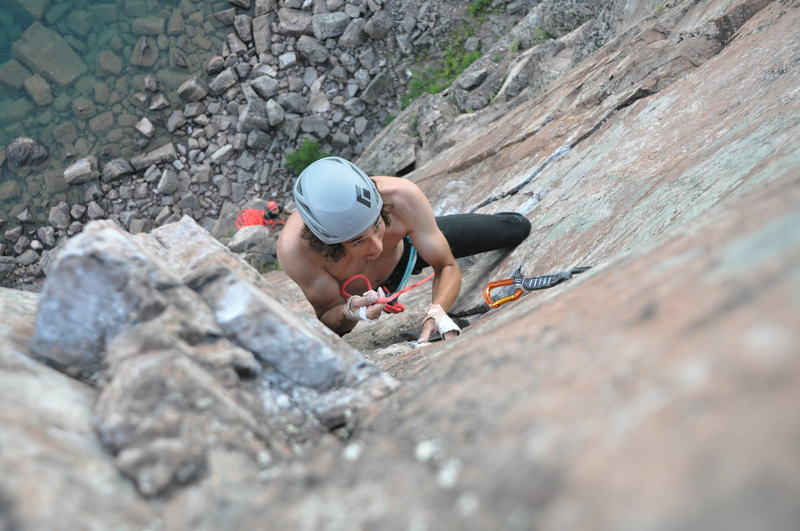 Clipping the Piton at the crux