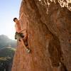 Honnold on pink wall... using a rope...