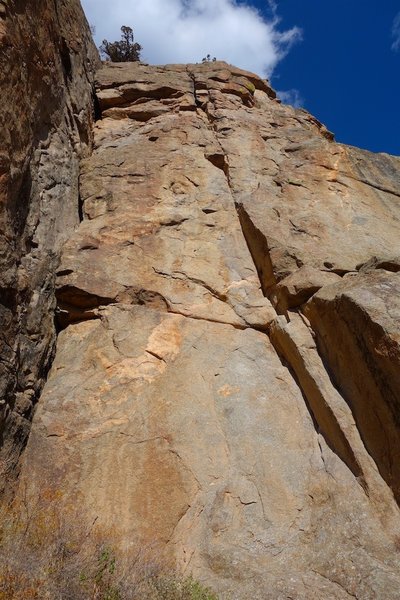 Pitch 6 (5.11 option). Happy Ending climbs the crack system starting in the lower right of photo.