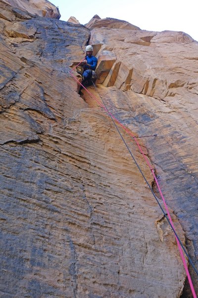 Pat in the chimney pod before the steep fingercrack on P3.