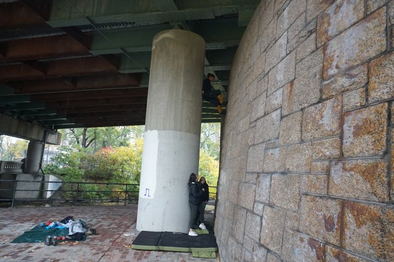 Susan demonstrating chimney technique on north side of Kenmore Tall Wall.