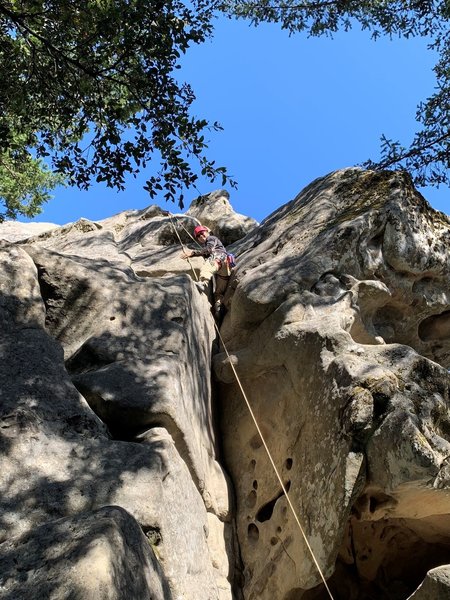 Climbing Chock Stone after passing the crux.