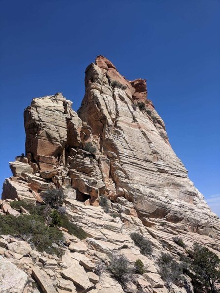 The right leaning chimney is the standard route. The left crack making up the obvious V is a little more difficult and requires a spicy traverse to get back over into the top of the standard route 5.6 chimney.