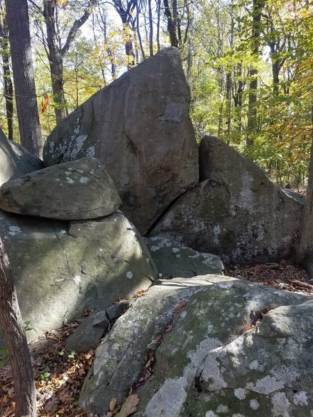 It's the two nestled boulders furthest away. Use feet to get on, follow arrete, dont use feet on the right boulder once you get to the vertical section.