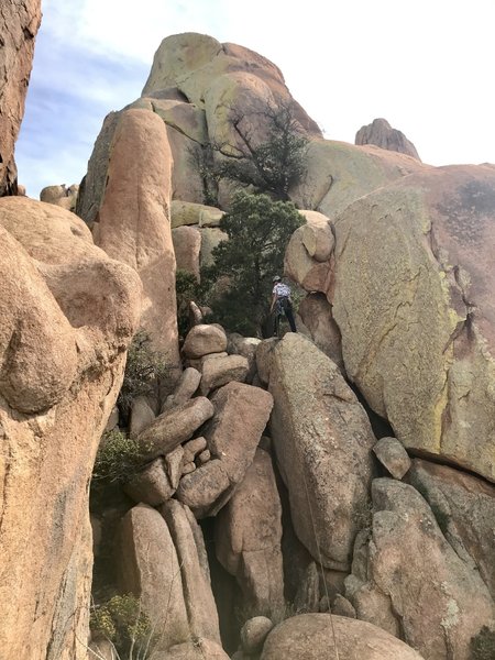 This is a pic of where you move the belay. Setup the belay under the obvious chimney. 2 chimneys and a short crack to the summit
