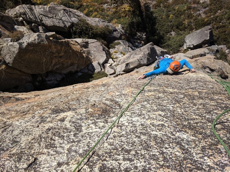 Shaun following the amazing face climbing on P2 of Superman.