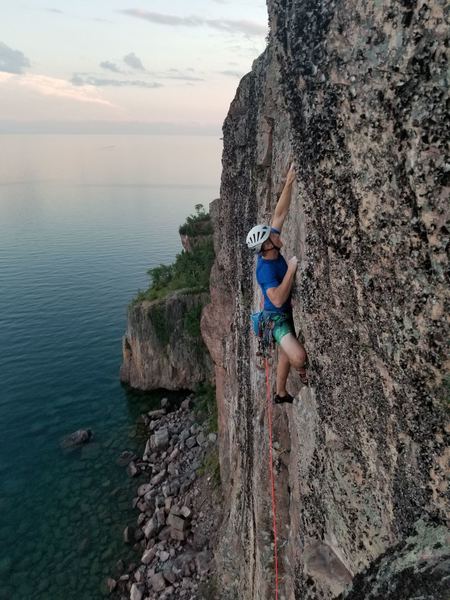 Firing off the last few crux moves of Lapidarian.
<br>
It stays on you until the very end.
<br>
Photo by Slavomir Tkac.