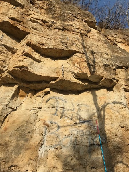 The bottom of the route. Use a long draw for the first bolt to avoid rope drag on the roof.