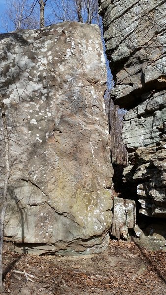 Terfah, V0. Solid landing, great holds, walk off back of boulder.