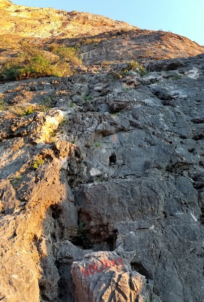 Holiday in Cambodia Ext. enjoys nice face climbing with a spectacular view.