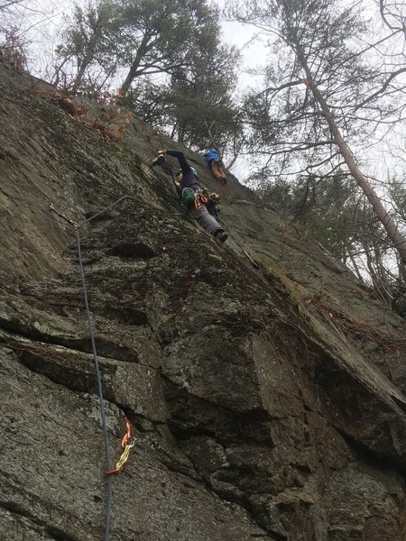 Curtis Baird ground up first ascent and drilling on Cougar Leverage. Climber in background is on Music Seeping Through.