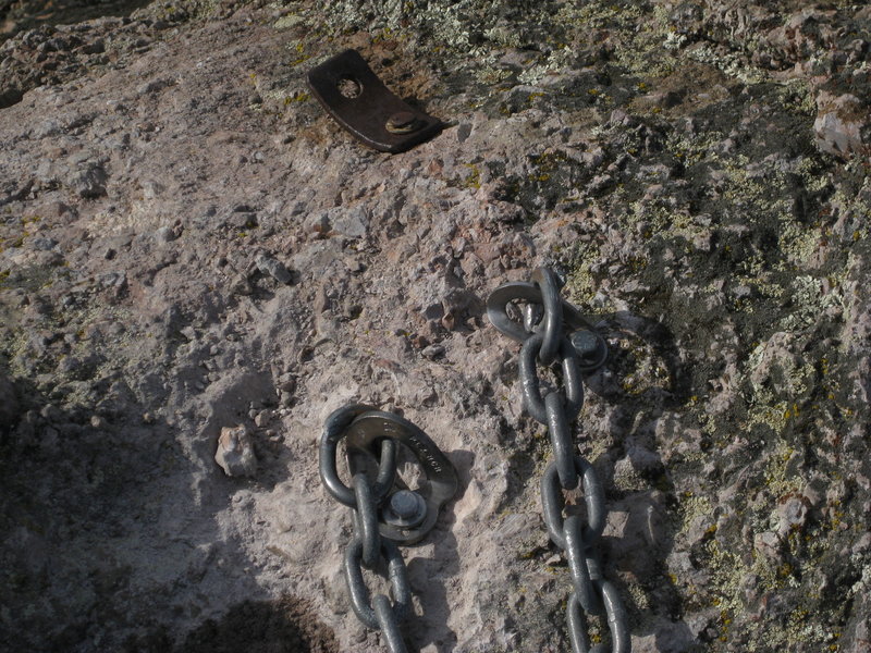 anchor as of 12-31-19. The replacement bolt is on the left. The right bolt is a carbon steel sleeve bolt with a stainless SMC hanger in good shape. The old bolt with tab hanger is the original single bolt summit anchor.
