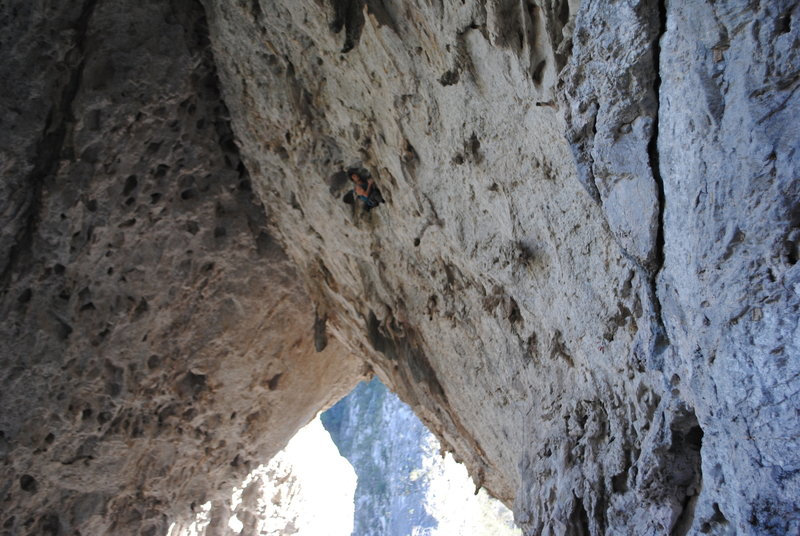 Johnny going up the El Jabalí Salvaje (The Wild Boar) 5.12b at a stunning limestone arch in Monterrey, Mexico.