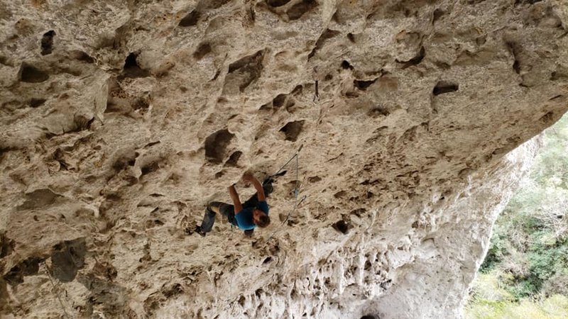 Mark Grundon on the first ascent of his route Grunon Viejo, 5.12b, at a Limestone Arch near Monterrey, Mexico.