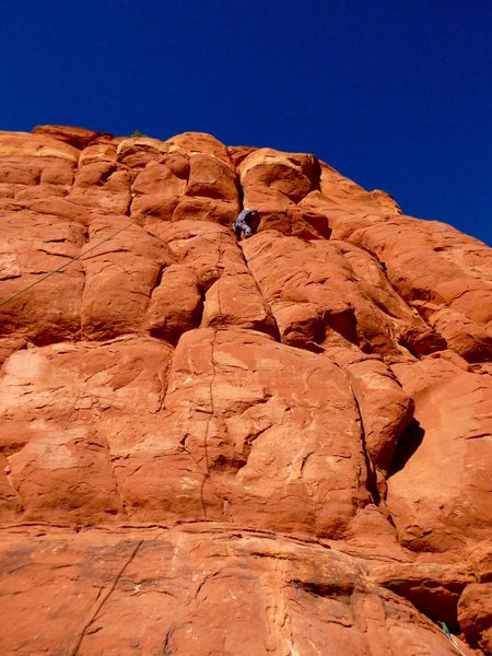 Doug Biber himself came wandering along and accepted our invitation for a toprope burn. "This is very different from Nirvana!" he laughed. Here he is wrestling with one of the crux bulges, roughly one-third of the way up.