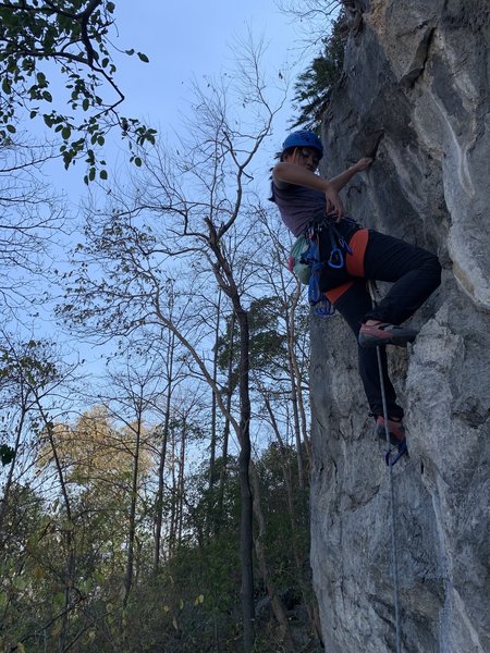 Aeriel on the FA during her Multi pitch course
