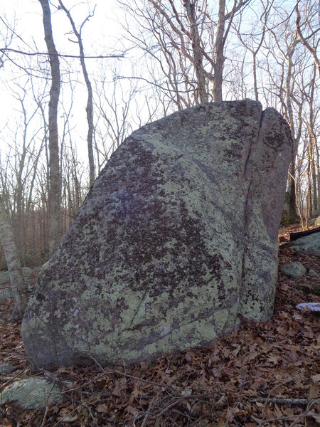"Hammer Claw" is the grooved crack on the right being climbed from the back of the boulder.