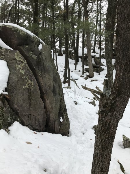 The boulder from the left