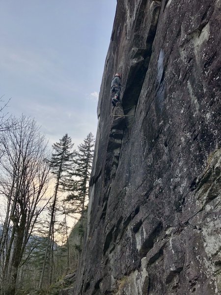 climber leaving Batskins and heading up the finger crack