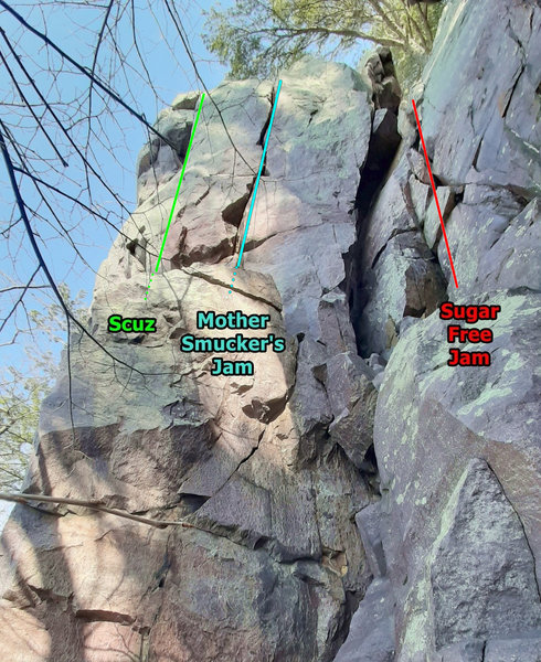 Sugar Free Jam, Scuz, and Mother Smucker's Jam. Scramble halfway up between the 2 towers to start these climbs.