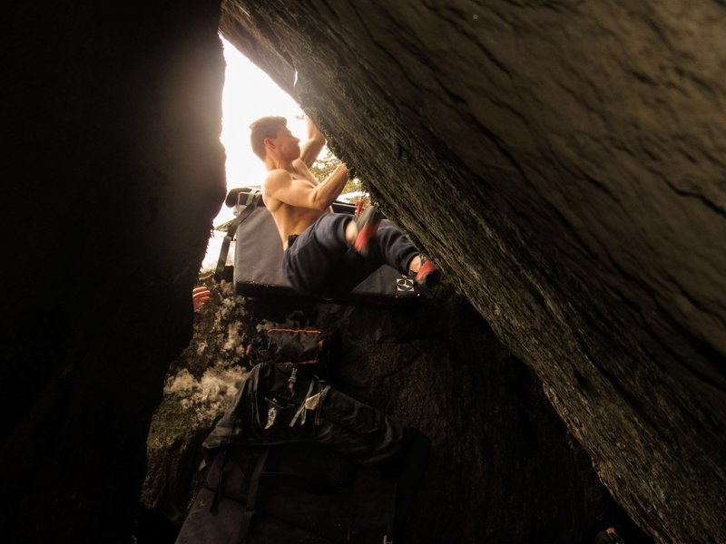 Cody climbing it