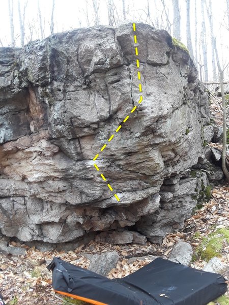 Low hanging start on a good ledge. Power move to the second ledge then match. Another powerful move to a sloppy crimp with a thumb. Move up to a side pull, then reach to the top.