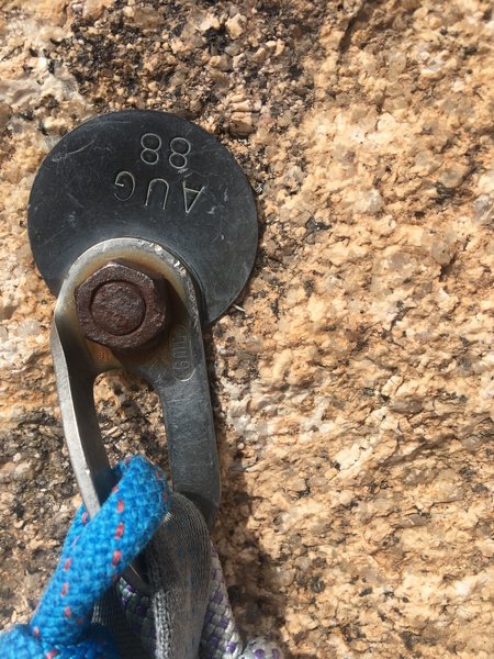 Historic bolts on top of P1. We used them and they were fine although you can avoid it by belaying in the crack just below or on chickenheads nearby.