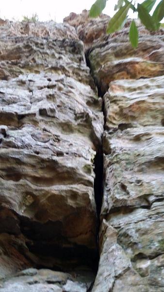 Spoke Junkies crack, above a small cave