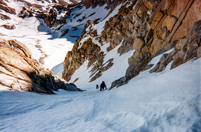 I took this one looking down from above as Larry Cote and Craig Morris race the sun on perfect neve.