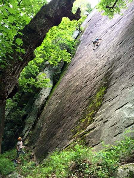 Somewhere around bolt 3 on a particularly dank Spring day a few years ago. Cannot remember who took the photo, there was a large group of us, but that's Ken pushing the rope up for me.