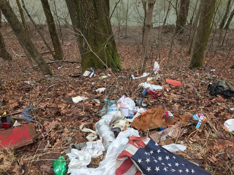 hike past trash off road down to creek