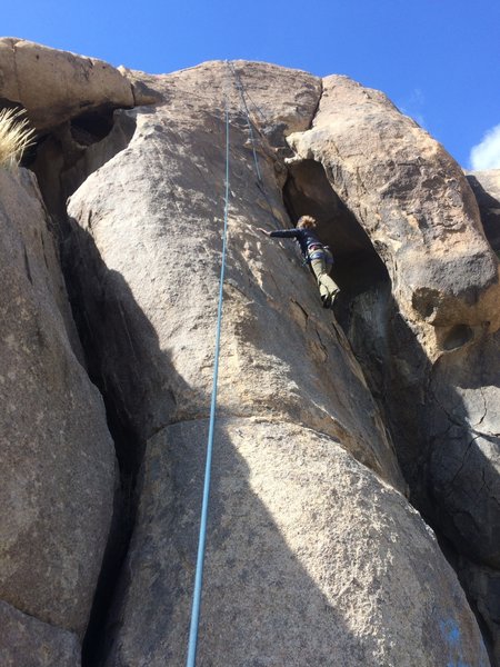 Camille on Run for the Border, the 5.9 is roughly where the belay rope is