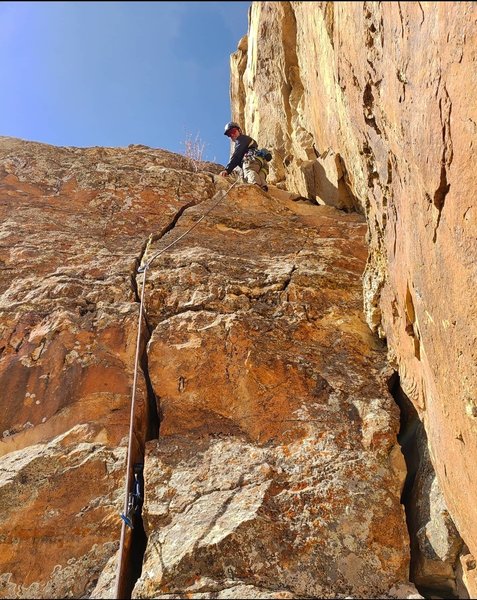Can be climbed as a crack or a face climb