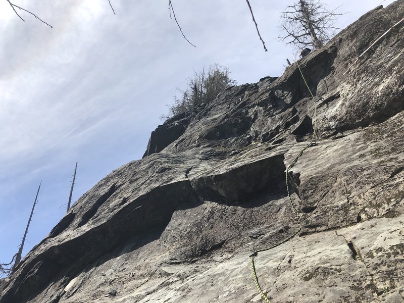 Partner knocking out his second sport lead. With high snow levels we started two-three bolts up and had awkward belay stance. No move was harder then 5.7. He crushed it.