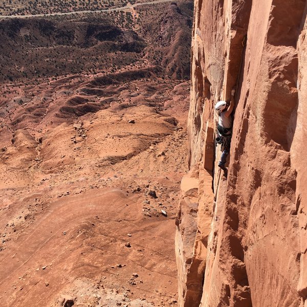 Climber following a leader on the wide pitch of Black Sun. Wild angle that I took from Kor-ingalls. Not sure who the climbers are but they were friendly!
