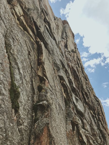 Taken from just left of the start, the route goes into the left-facing corner at the top of the photo