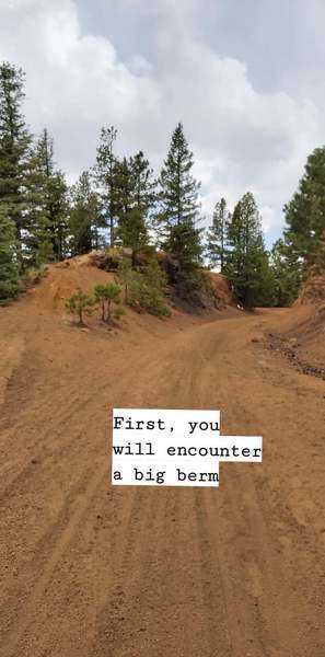 Traveling for about 2 miles down Gold Camp Road, you are getting close when you see a berm on the left.