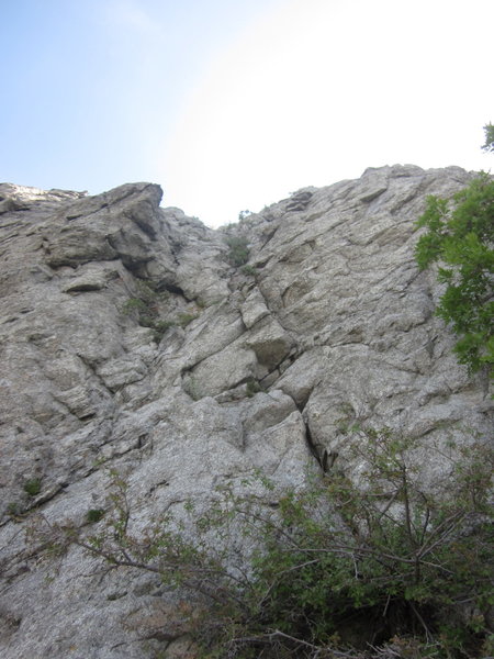 "Zoinks" starts at the right of the crack in the center and continues to veer rightward to the top. "Jeepers" starts to the left and goes up and around the block in the top-left of the photo.