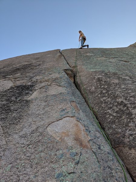 The anchor on the route to the right can easily be used to toperope Kryptonite. I used a #2 to help redirect the climber strand as the anchors are about 5-6 ft to the right of the top of the crack.