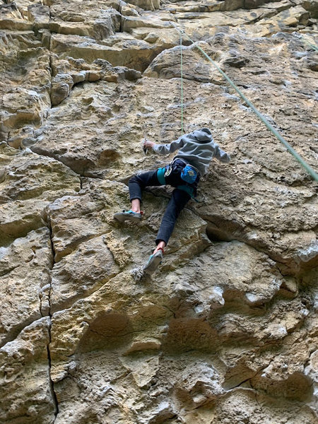 This is a picture taken of a person at the beginning of the crux.