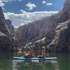 Preferred transportation through the canyon. Paddleboards provide an easy start to climbs!
