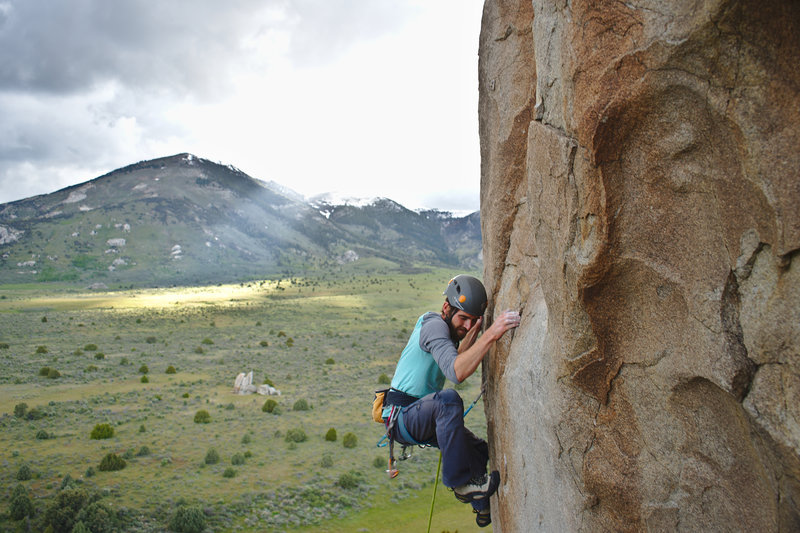 Jaden Lojik stepping up to the exposed arete on Claim Jumper.