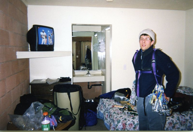 Racking up at the hotel with the heater blasting before a winter ascent.  (DEC 1998)