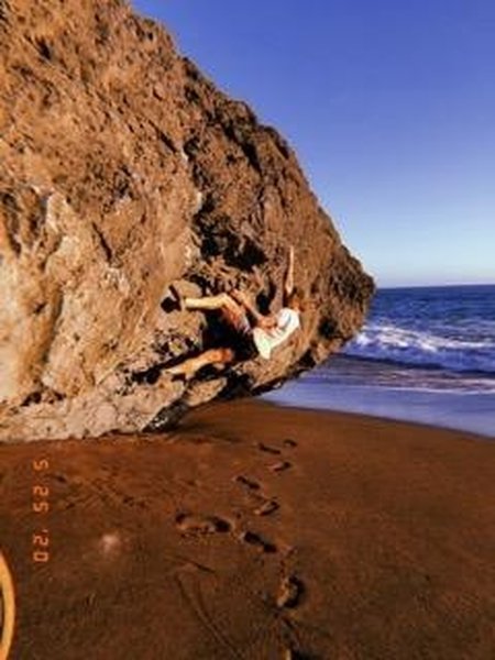 small bouldering area on the left side of beach, before you turn the corner to the majority of climbing at TV. very tide / sun dependent